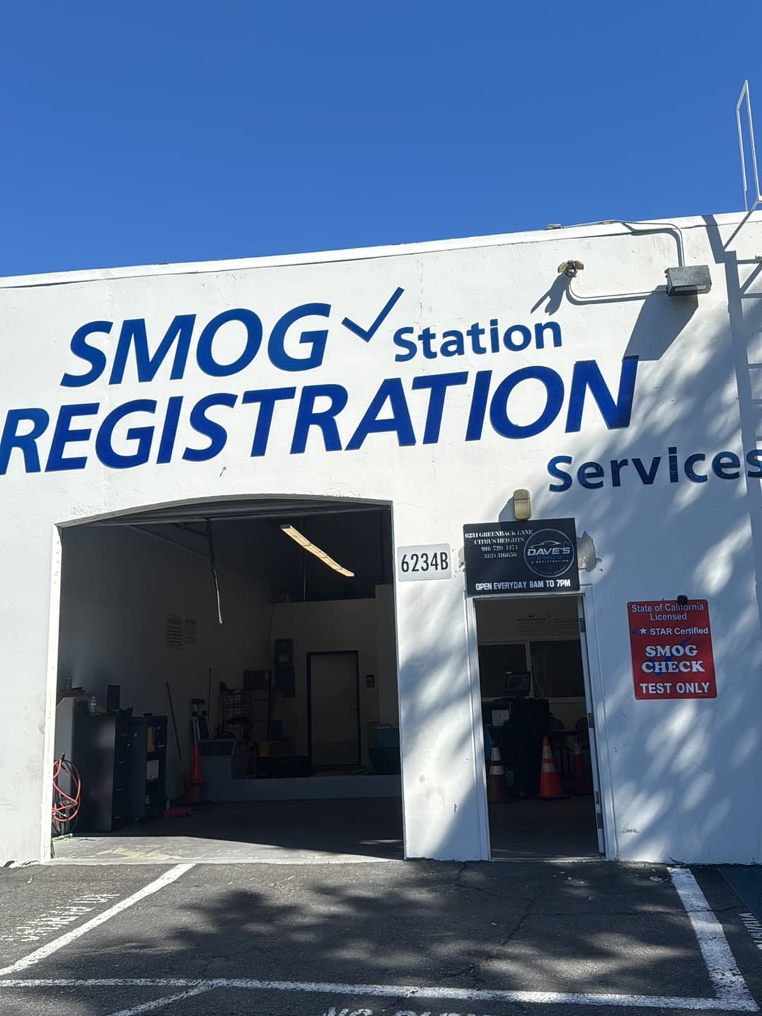 Dave's Smog & Registration storefront, with the State of California STAR Certified sign by the office door